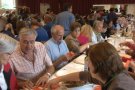 Unes 350 persones participen en l'Aplec de Sant Miquel del Mont de la Vall de Bianya que s'ha traslladat a l'Hostalnou degut al mal temps